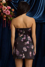 Chic Strapless Structured Tulip Mini Dress in Black Floral Print