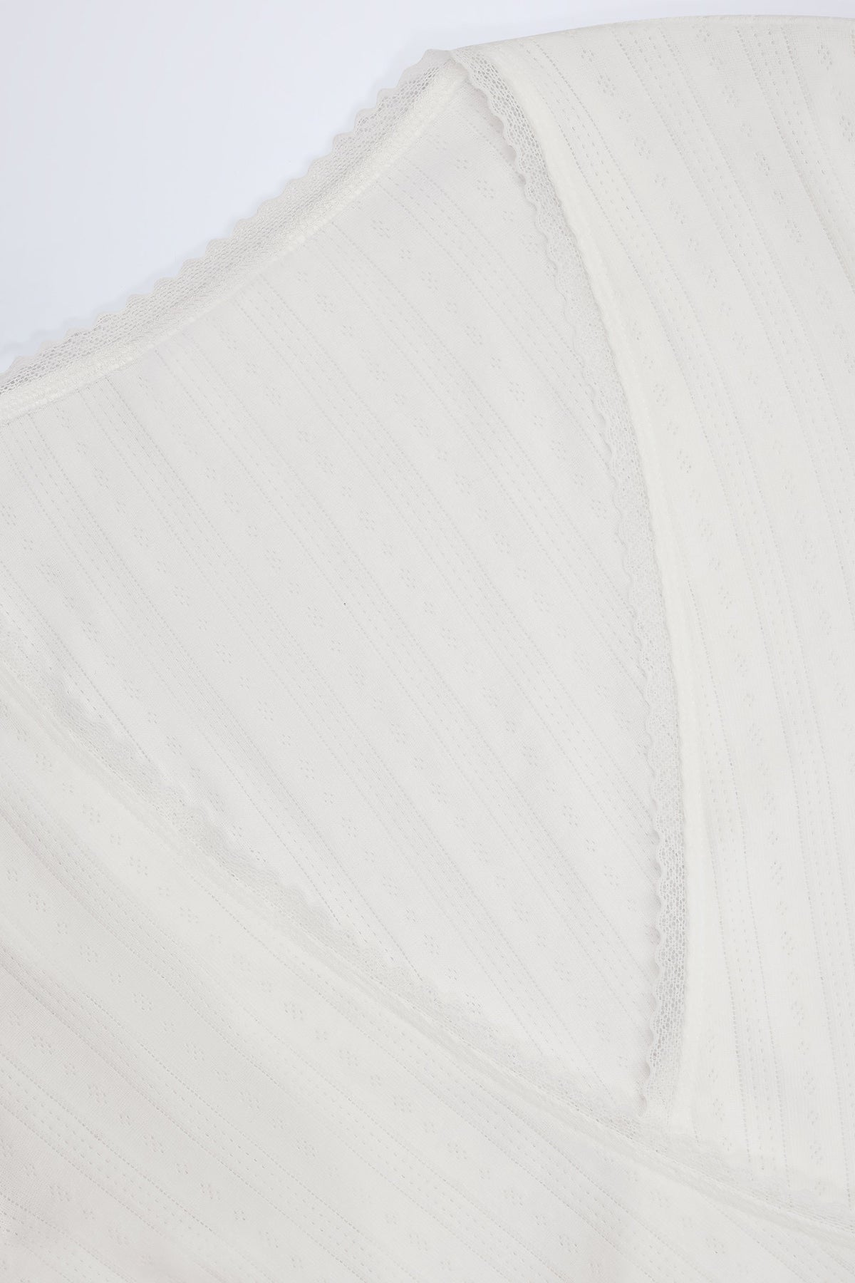 Chic Pointelle Wrap Crop Top in White