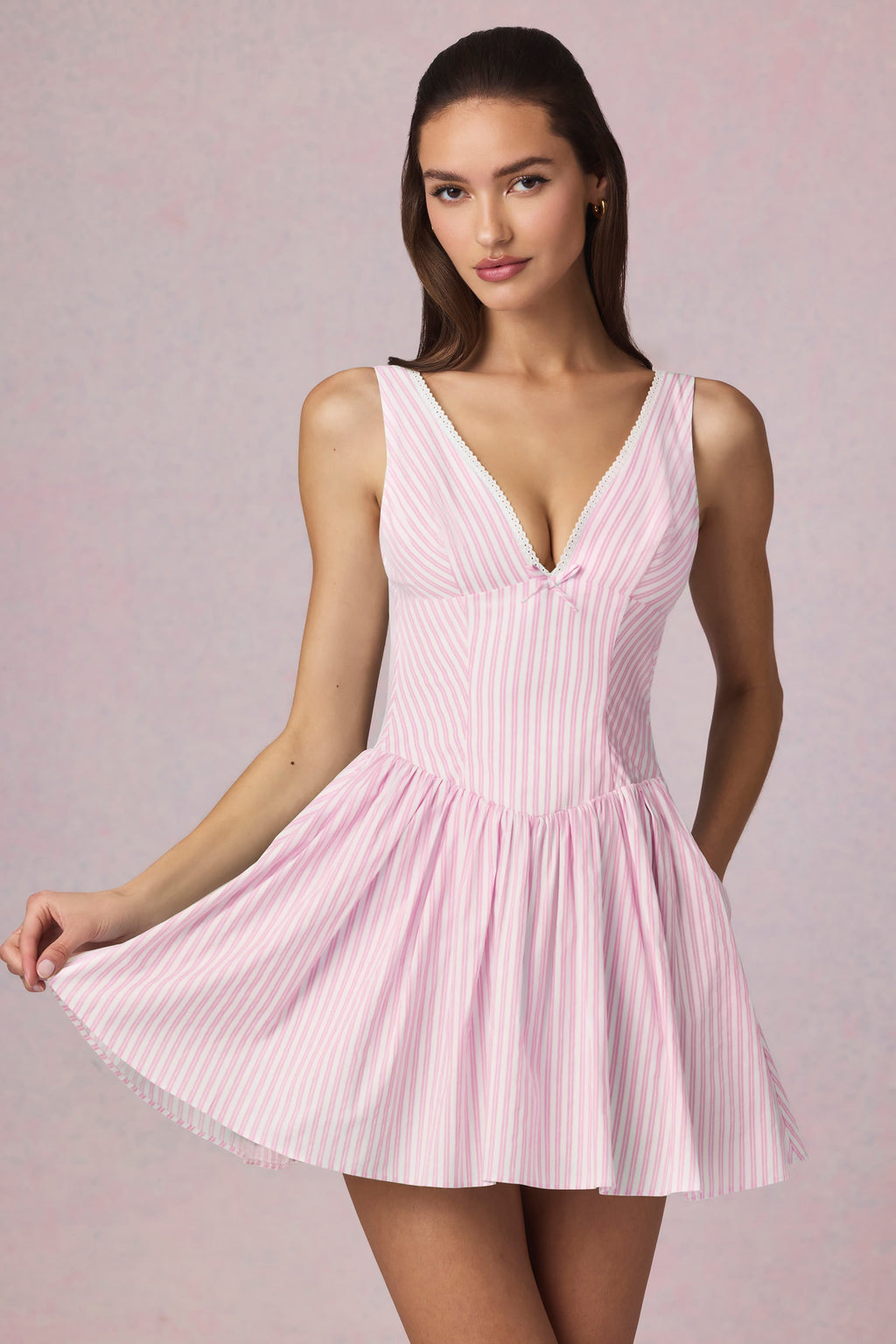 Chic Bow-Detail A-Line Mini Dress in Soft Mauve Stripe