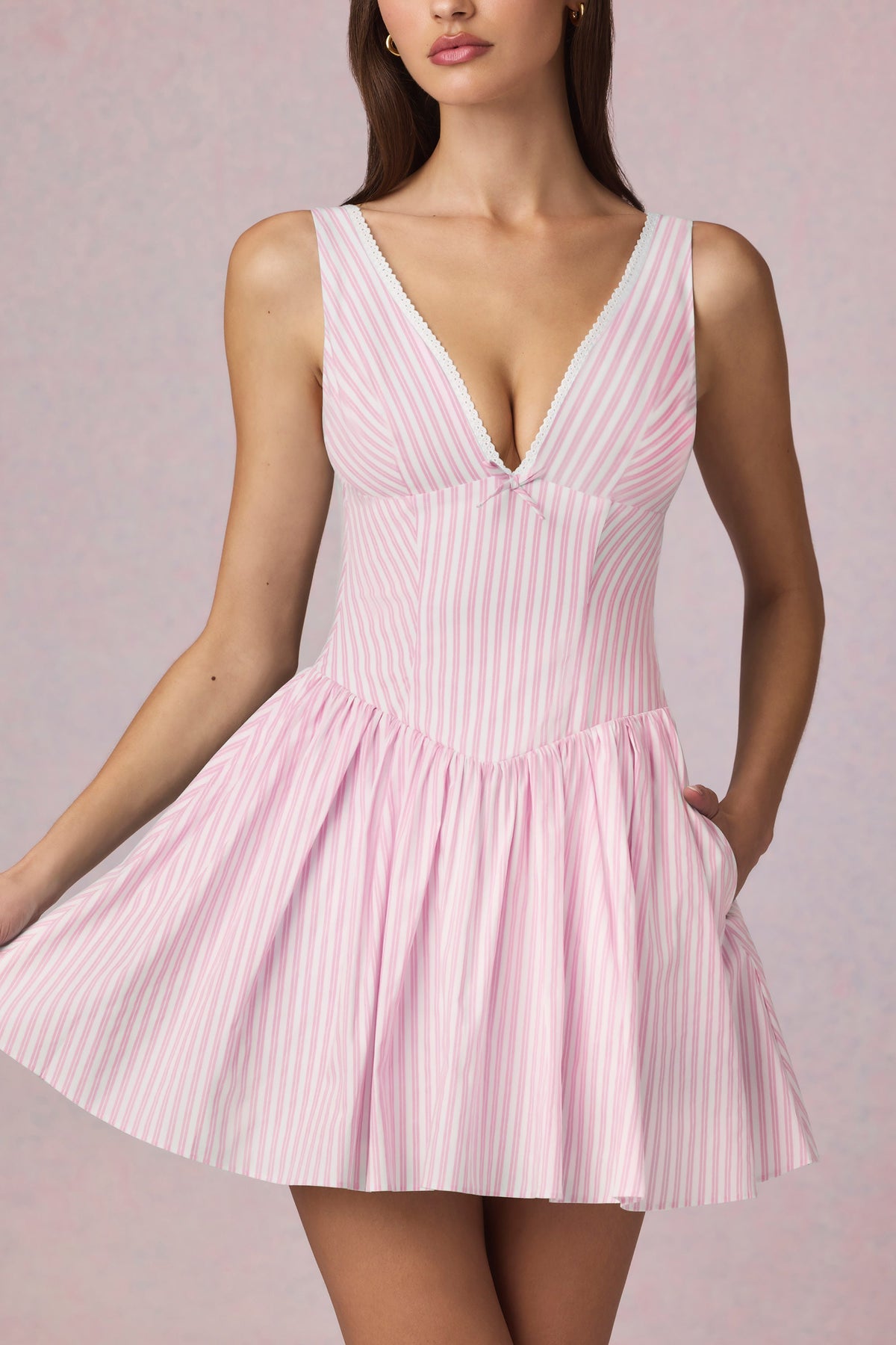 Chic Bow-Detail A-Line Mini Dress in Soft Mauve Stripe