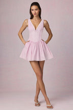 Chic Bow-Detail A-Line Mini Dress in Soft Mauve Stripe