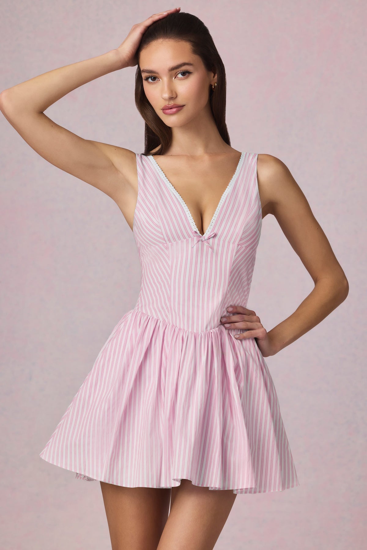 Chic Bow-Detail A-Line Mini Dress in Soft Mauve Stripe