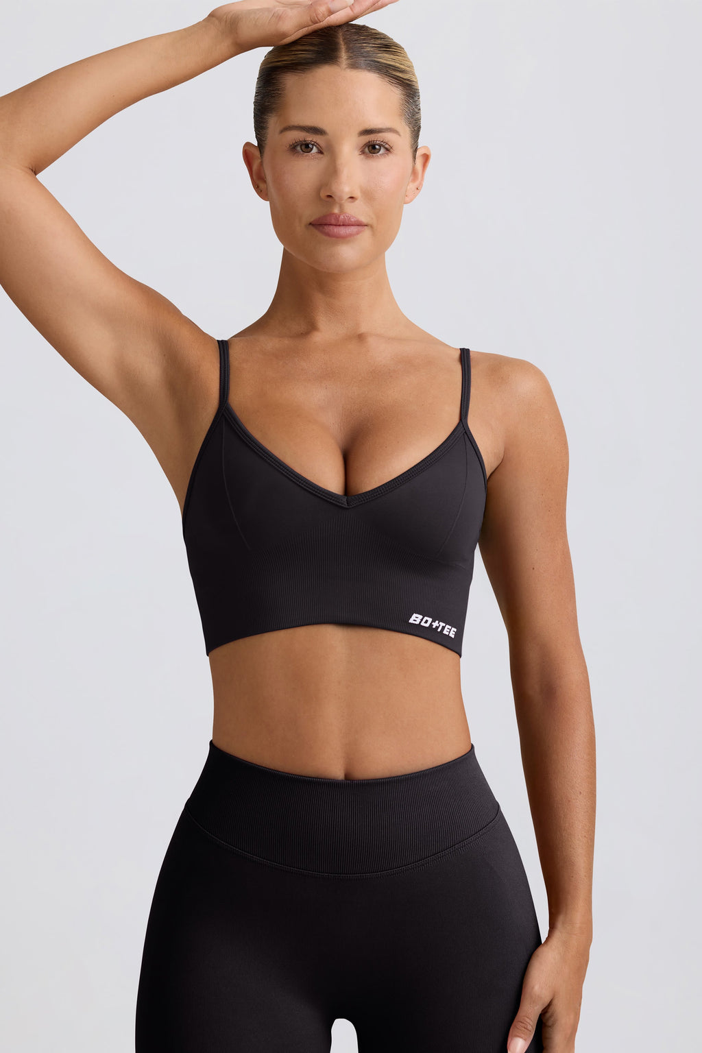 Chic Define Luxe V-Neck Sports Bra in Black