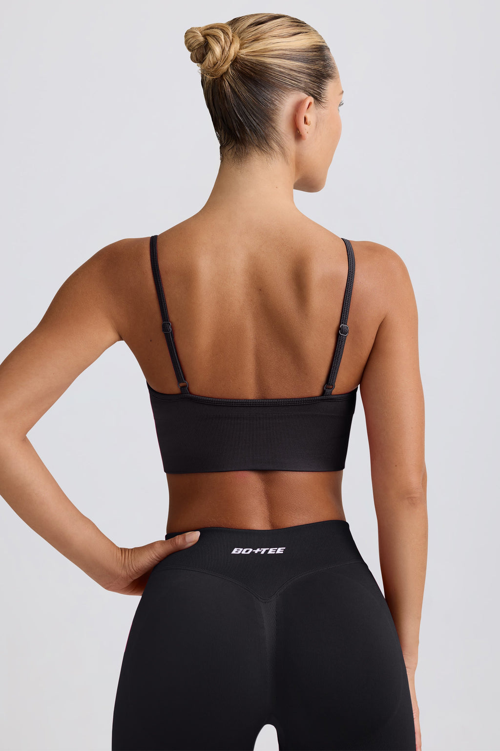 Chic Define Luxe V-Neck Sports Bra in Black