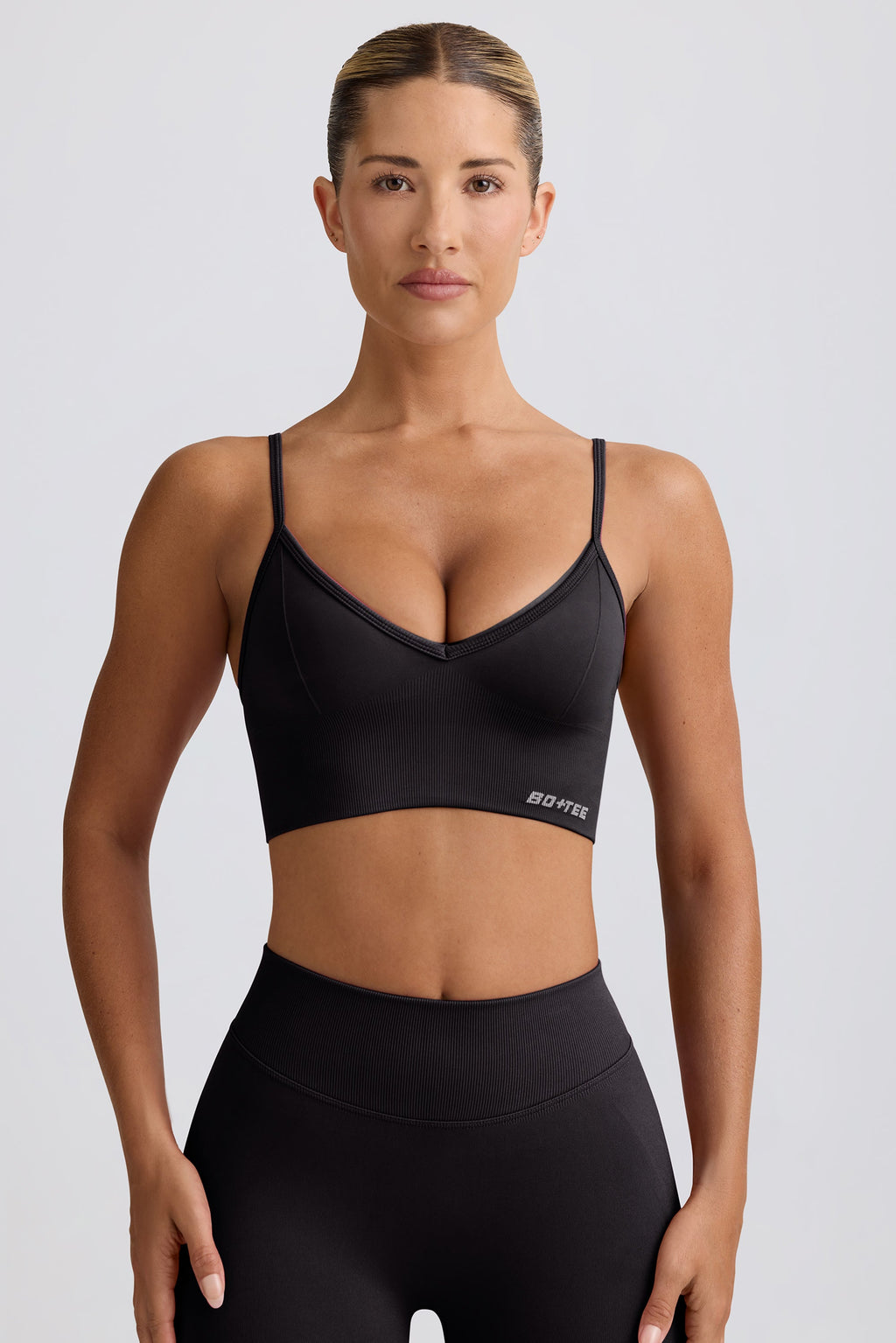 Chic Define Luxe V-Neck Sports Bra in Black
