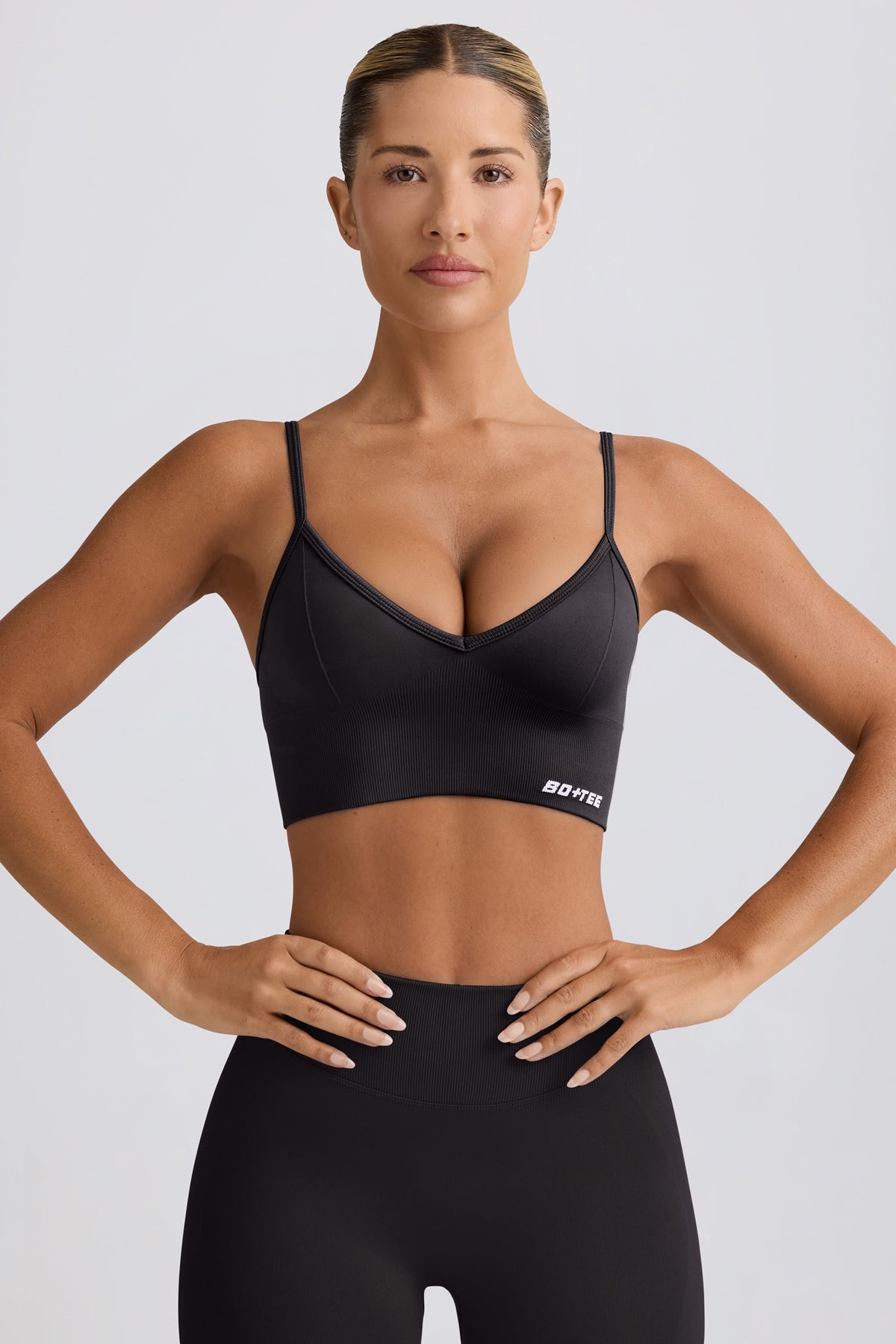 Chic Define Luxe V-Neck Sports Bra in Black