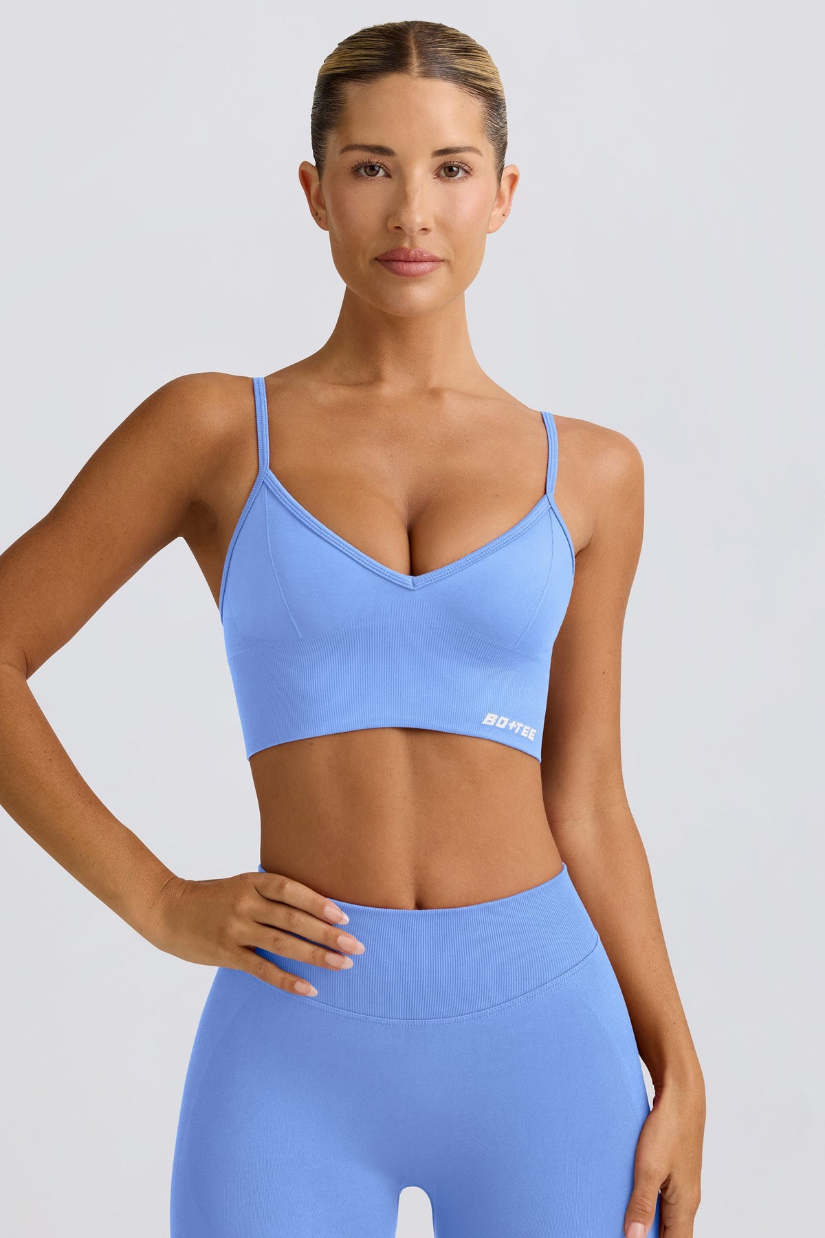 Chic Define Luxe V-Neck Sports Bra in Light Blue