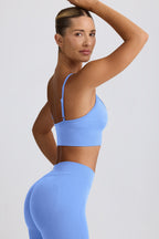 Chic Define Luxe V-Neck Sports Bra in Light Blue
