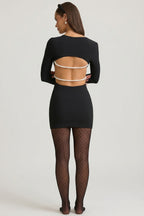 Chic Pearl-Detail Cut-Out Mini Dress in Black