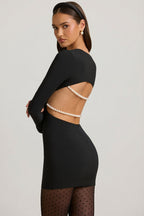Chic Pearl-Detail Cut-Out Mini Dress in Black