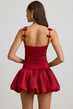 Chic Bow-Detail Ruched Bubble Hem Mini Dress in True Red