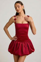 Chic Bow-Detail Ruched Bubble Hem Mini Dress in True Red