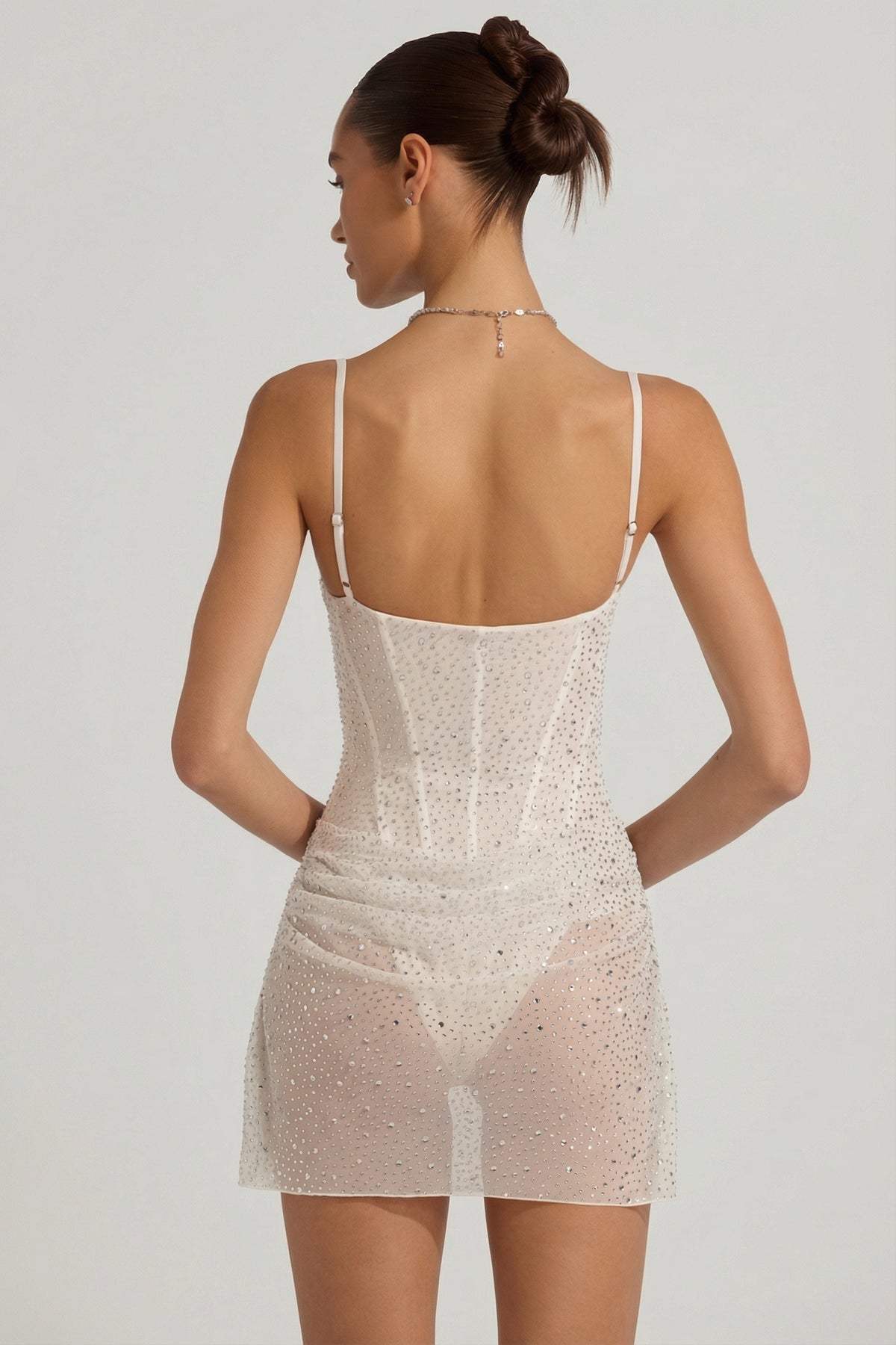 Chic Semi-Sheer Embellished Draped Corset Mini Dress in White