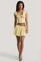 Chic Ruched Cotton-Poplin Mini Skirt in Lemon Yellow