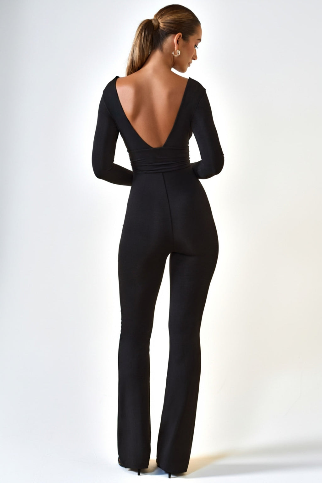 Chic Modal Ruched Plunge Flared Jumpsuit in Black