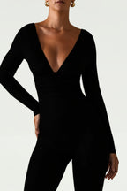 Chic Modal Ruched Plunge Flared Jumpsuit in Black