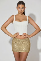 Chic Embellished Low-Rise Mini Skirt in Gold