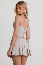 Chic Low-Rise Pleated Mini Skirt in Ecru