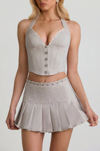Chic Low-Rise Pleated Mini Skirt in Ecru