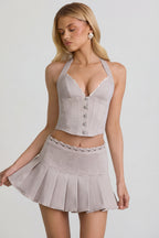 Chic Low-Rise Pleated Mini Skirt in Ecru