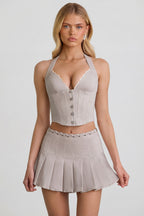 Chic Low-Rise Pleated Mini Skirt in Ecru