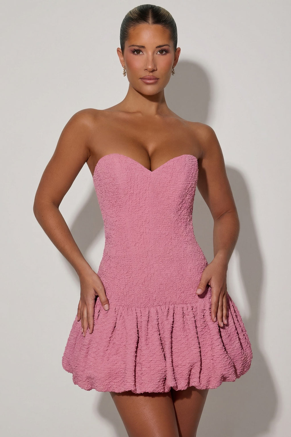 Chic Cut-Out Bubble Hem Corset Mini Dress in Dusty Pink