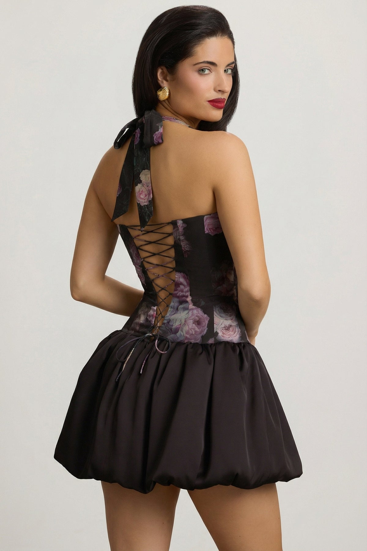 Chic Halterneck Lace-Up Bubble Hem Mini Dress in Black Floral Print