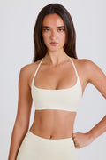 Chic Scoop-Neck Halterneck Sports Bra in Cream