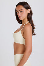 Chic Scoop-Neck Halterneck Sports Bra in Cream
