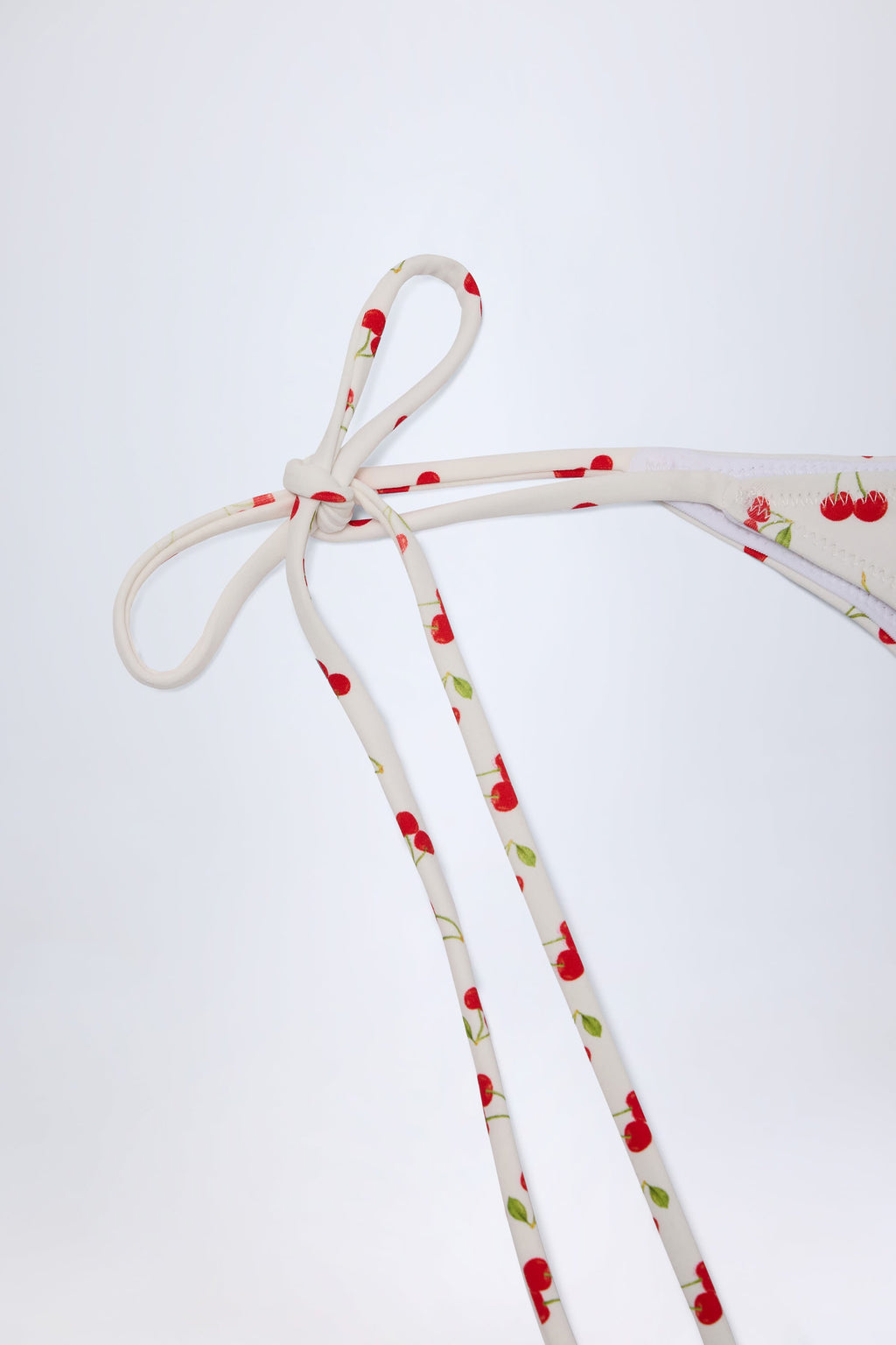 Chic Side-Tie Cheeky Bikini Bottoms in Cherry Print