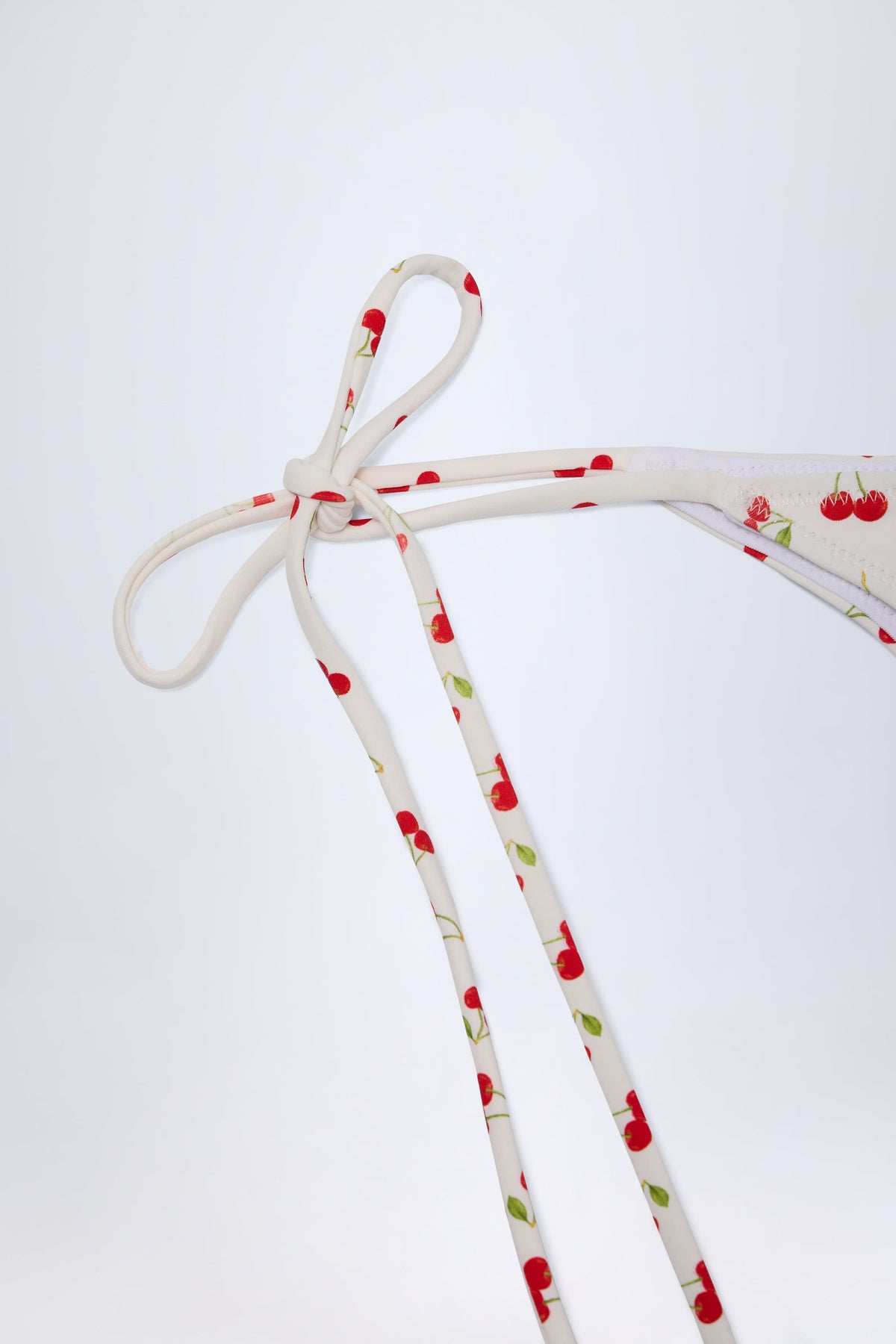 Chic Side-Tie Cheeky Bikini Bottoms in Cherry Print