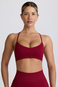 Chic Super Sculpt Seamless Cross-Back Sports Bra in Burgundy