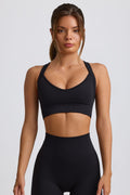 Chic Super Sculpt Seamless Crossback Sports Bra in Black