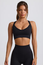 Chic Super Sculpt Seamless Crossback Sports Bra in Black