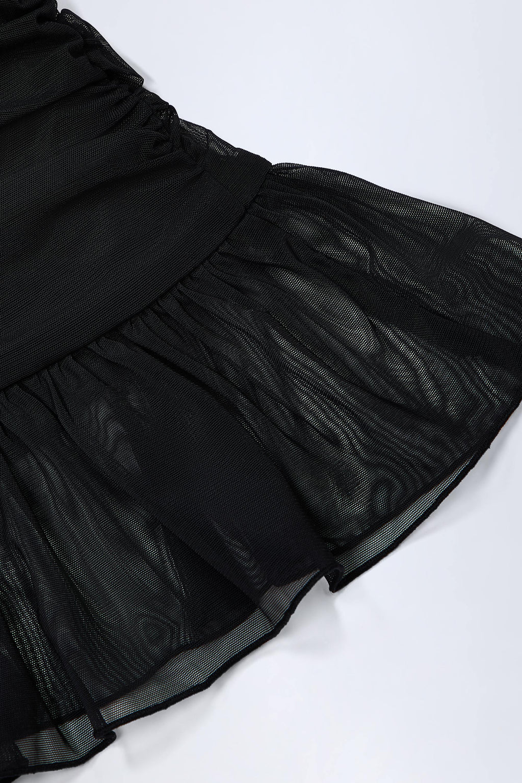 Chic Hardware-Detail Ruffled Mid-Rise Mini Skirt in Black